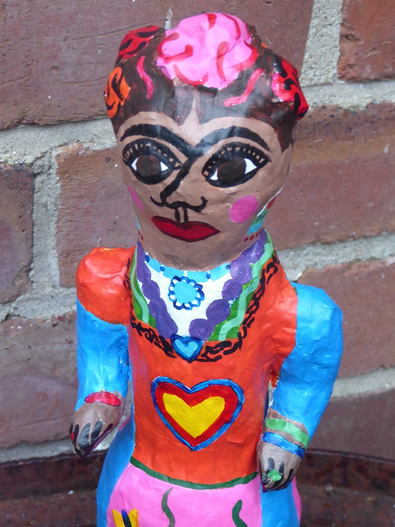 Close up of Frida Kahlo papier mache doll by Anna-Maria Bribiesca
